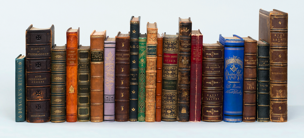 colorful books stacked on a shelf