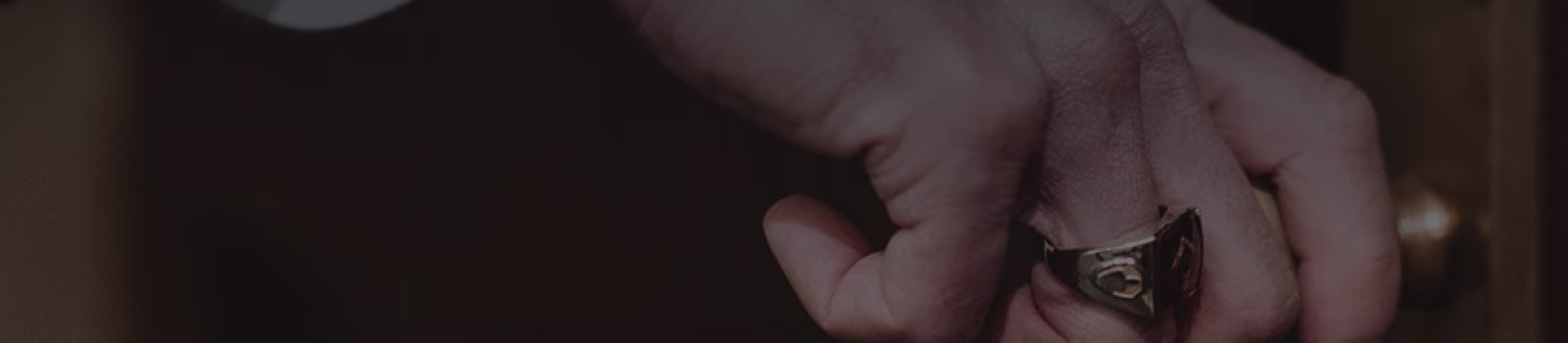 image of a man's hand with a ring