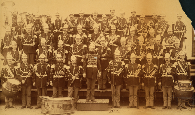 A sepia-toned photo of the late 19th century United States Marine Band