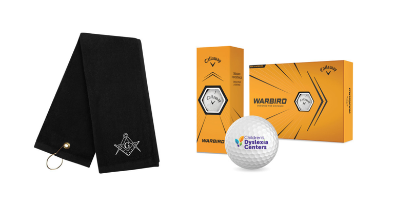 A square and compasses branded golf towel and a Children's Dyslexia Centers branded golf ball