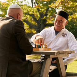 two men of differing religions playing chess