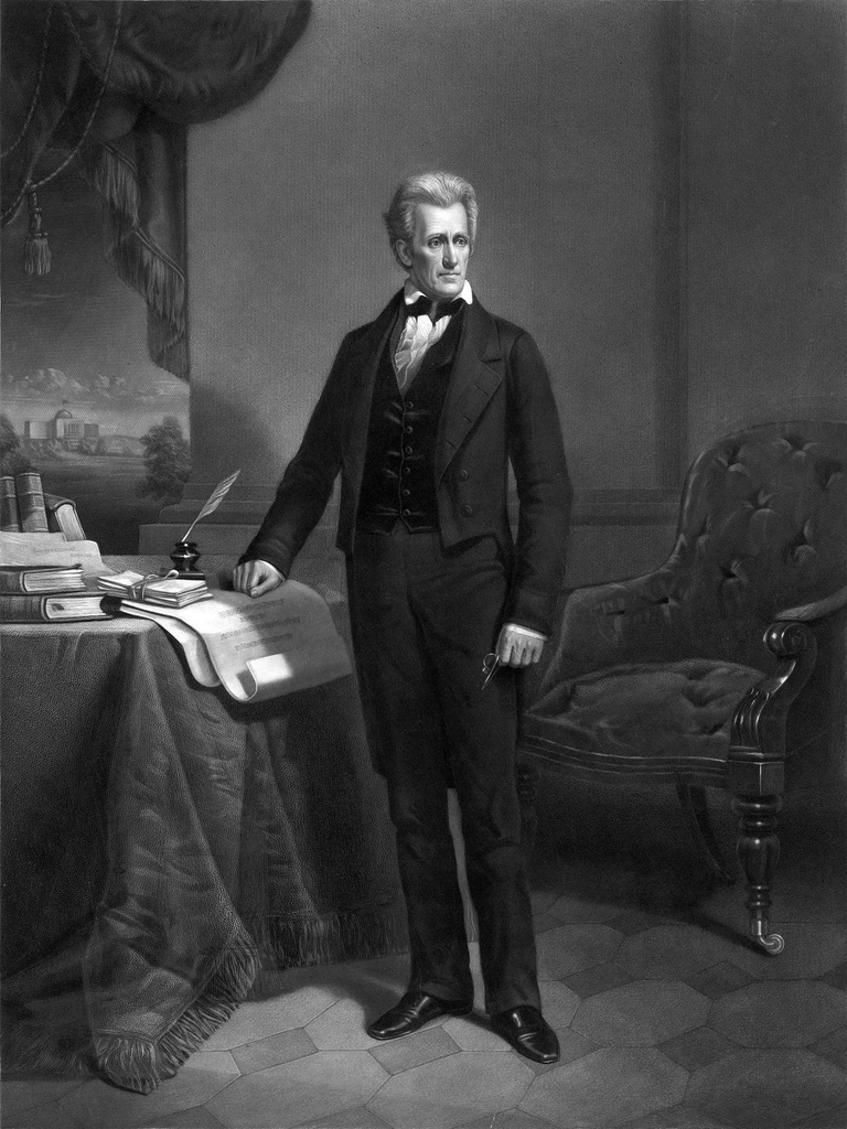 An engraving of Andrew Jackson standing, resting his hand on a table.