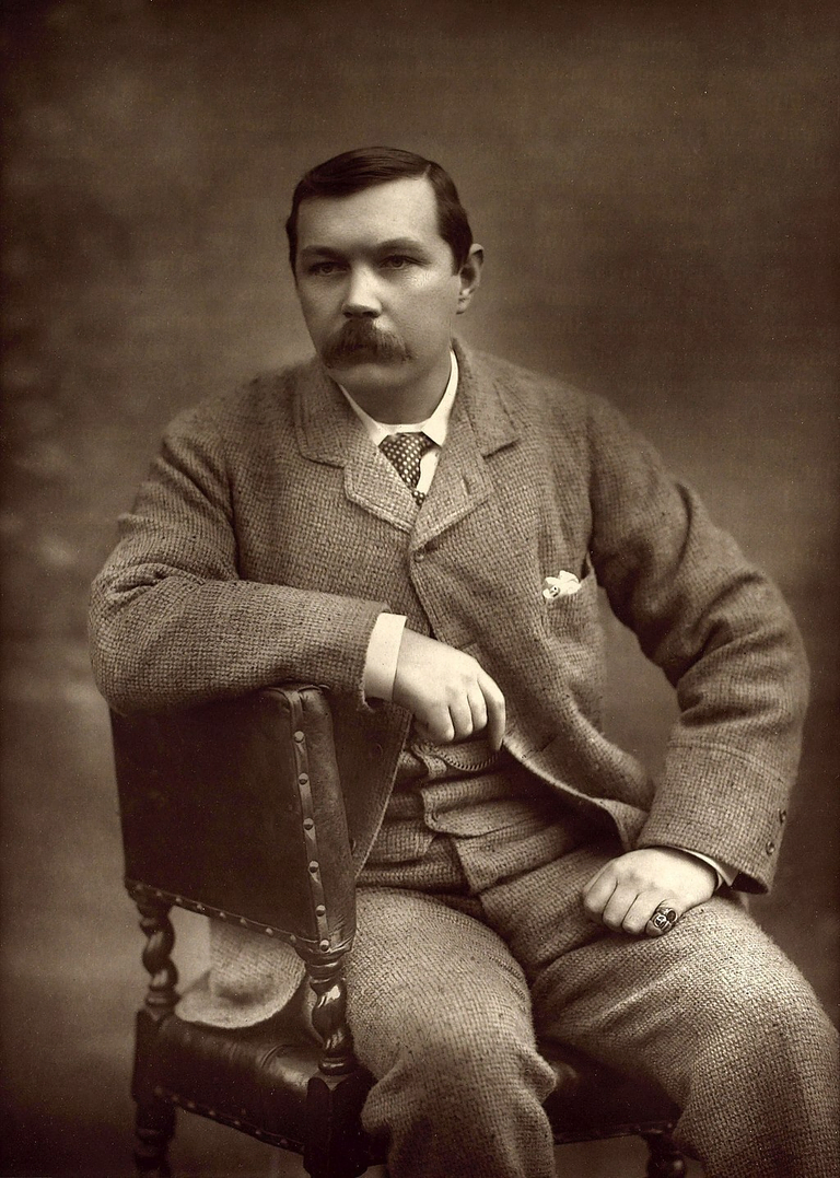 Portrait of Sir Arthur Conan Doyle sitting in a tweed suit, c. 1893