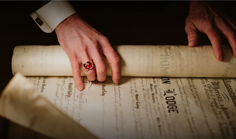 freemason unveiling a scroll