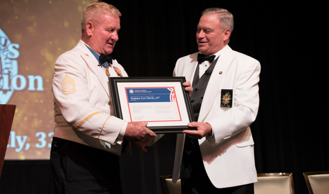 Dave Glattly presenting award to Sammy Lee Davis