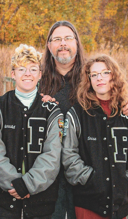 A photo of a Scottish Rite, NMJ brother and his two daughters