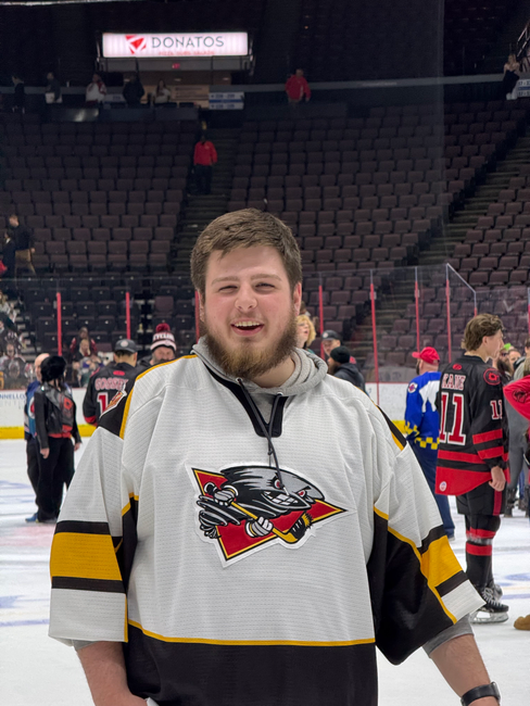 A young Scottish Rite Mason displays his affinity for Cincinnati hockey