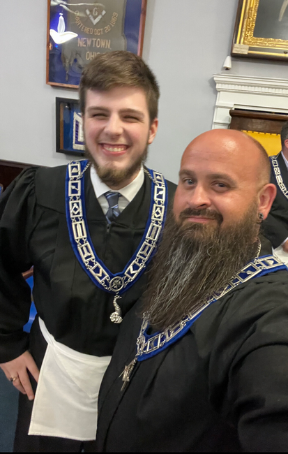 A young Scottish Rite Mason shares a selfie with an older Brother