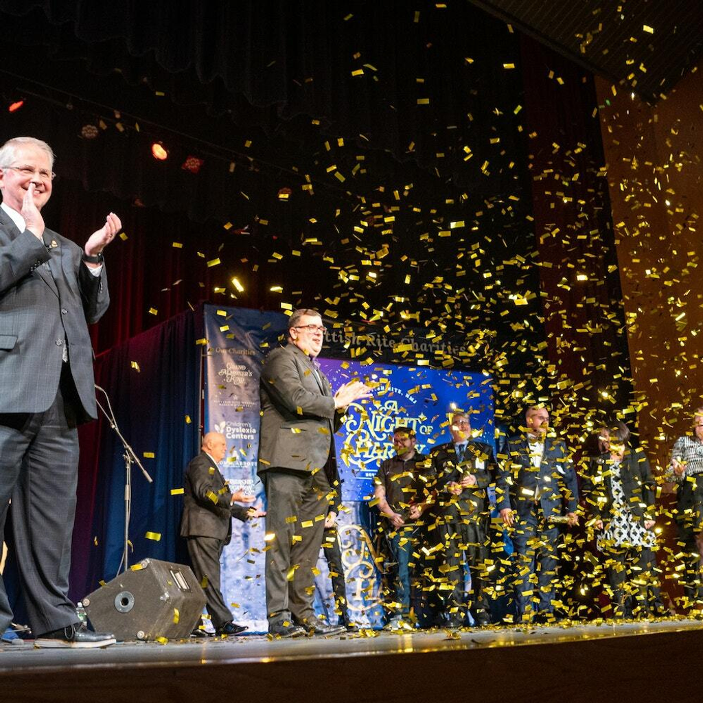 Celebration on stage at the Night of Charity 2022