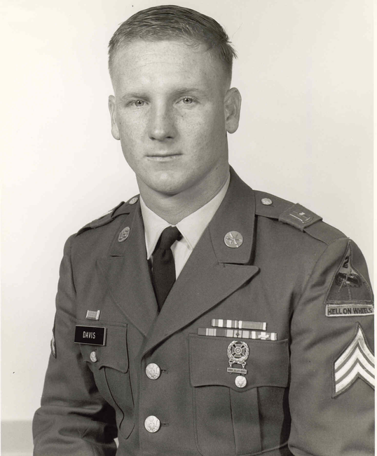 Headshot of Sammy Lee Davis in an army jacket with medals and patches