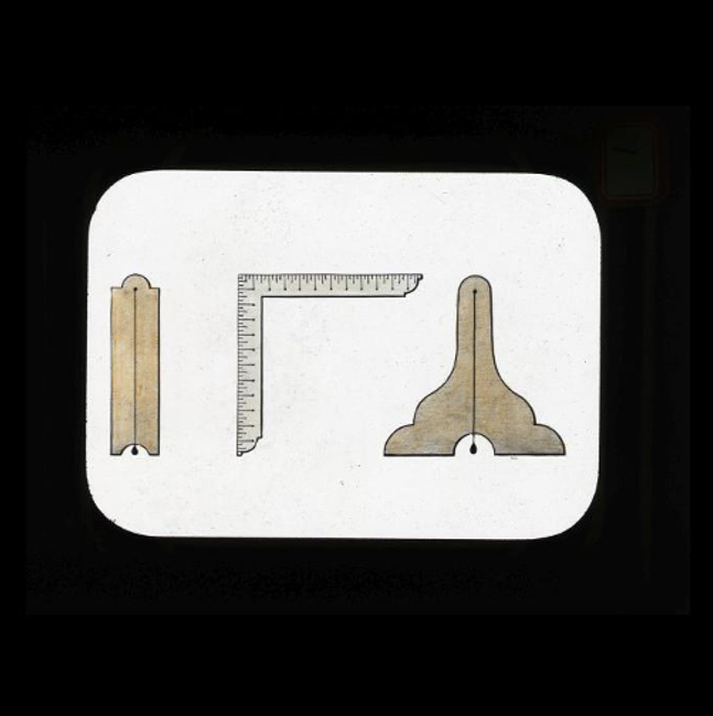 A Masonic Magic Lantern Slide depicting Masonic working tools of the Masonic plumb, square, and level.