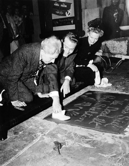 Red Skelton imprinting a show during the Hollywood Walk of Fame ceremony