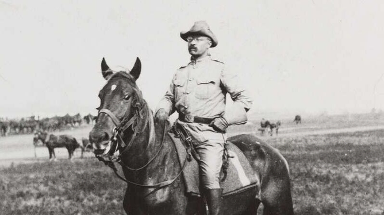 Stereograph showing portrait of Roosevelt on horseback.