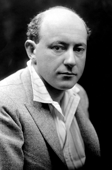 A black and white publicity portrait of Freemason Cecil B. DeMille