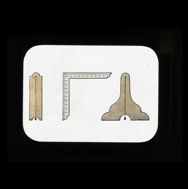 A Masonic Magic Lantern Slide depicting Masonic working tools of the Masonic plumb, square, and level.