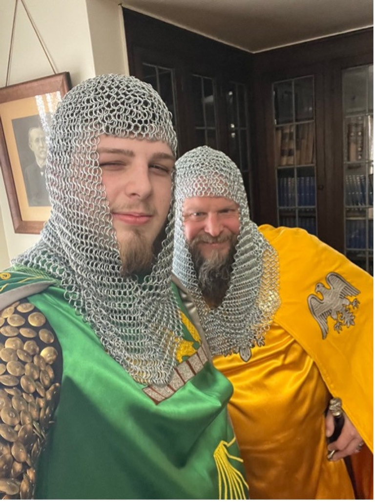 Two Scottish Rite Masons dressed in knight costumes for a degree performance