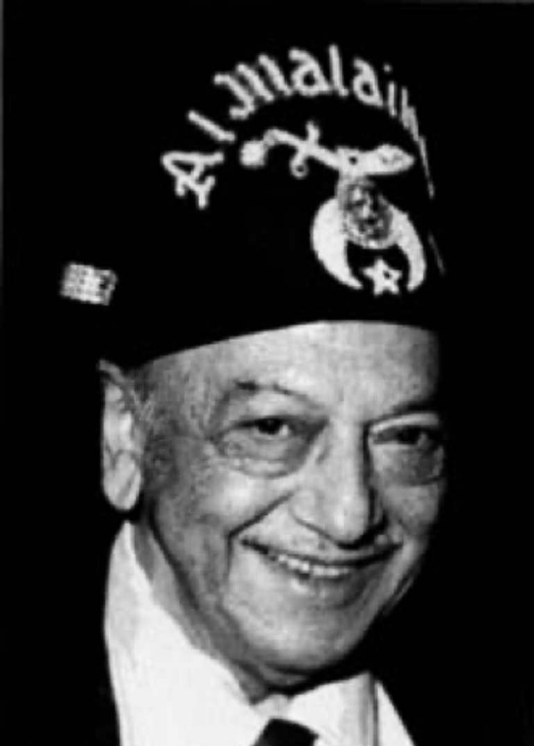 Voice Actor Mel Blanc wearing Shriner's Fez