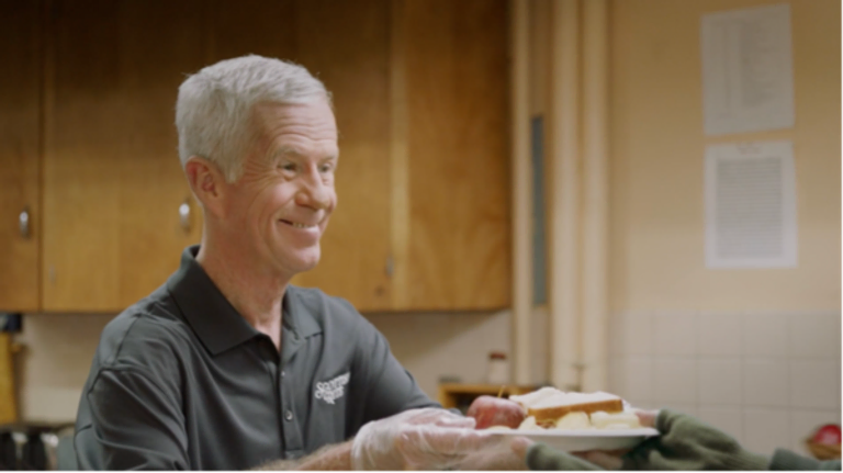A Freemason serving food
