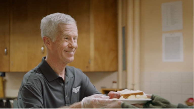 A Freemason serving food