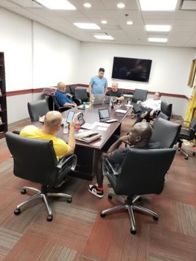 Men at a Freemasonry study session