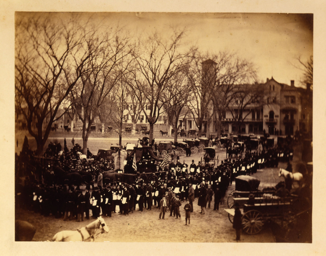 A group of Masons gathered for a Masonic funeral procession